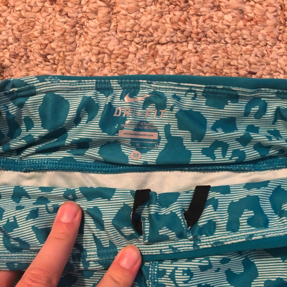 Nike  turquoise leopard workout pants/leggings